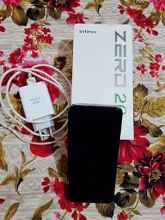 infinix zero 20 with box and  charger  full  box ha 0