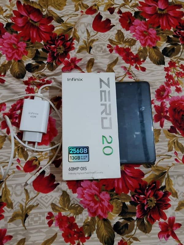 infinix zero 20 with box and  charger  full  box ha 1