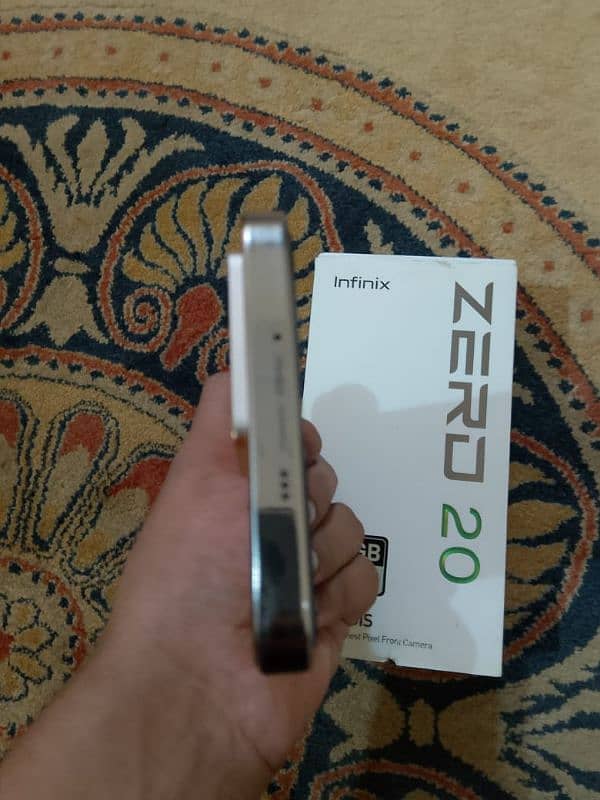 infinix zero 20 with box and  charger  full  box ha 9