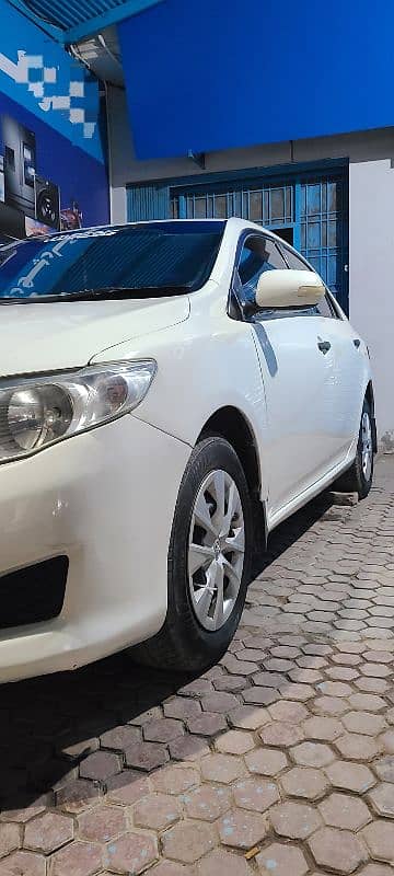 Toyota Corolla XLI 2010-11 4