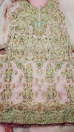 luxury embroidered fancy net dress