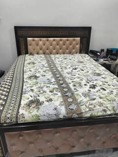 good condition rod iron bed with mattress 0