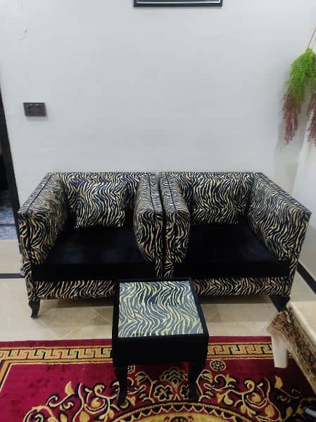 two-seater sofa with table 4