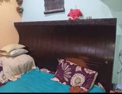 wooden bed good condition 0