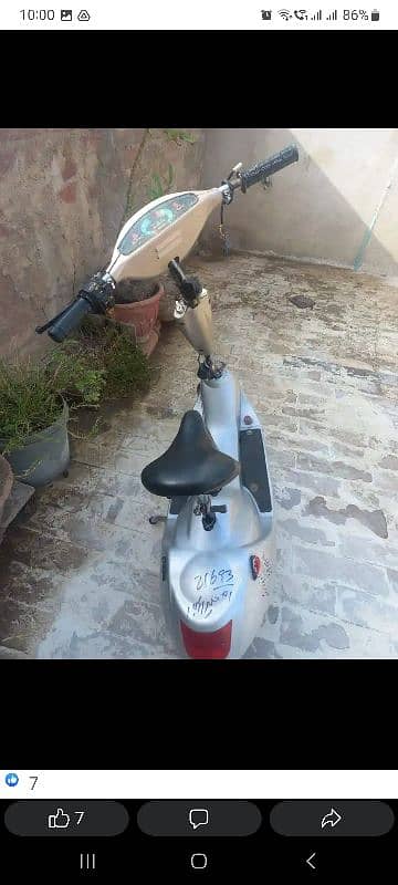 kids electric Scooty 11