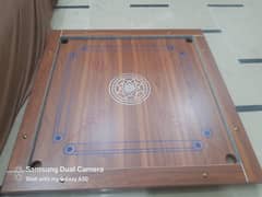 CARROM BOARD WITH WELL POLISHED WOOD.