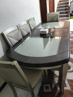 solid 8 seater dining table . . imported from uae