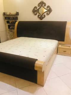 King size bed with 2 side tables.