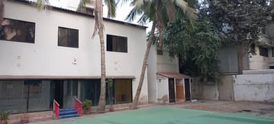 1200 Sq Yards Bungalow Near Shahrah E Faisal With Huge Car Parking Area 0