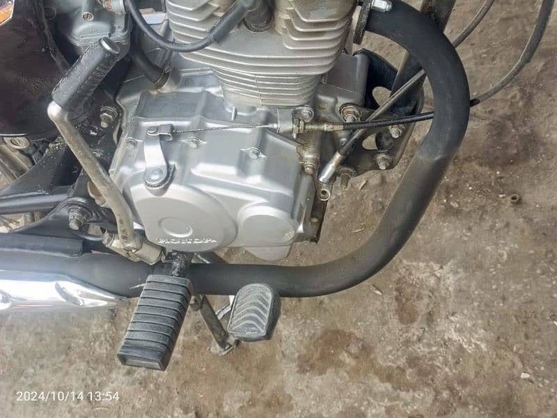 Honda 125 by 16 Sialkot Ka number ha 9