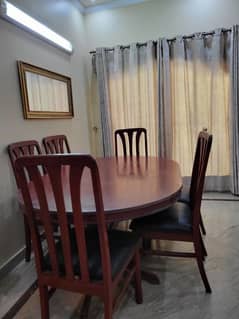 Wooden dining table with 6 chairs 0