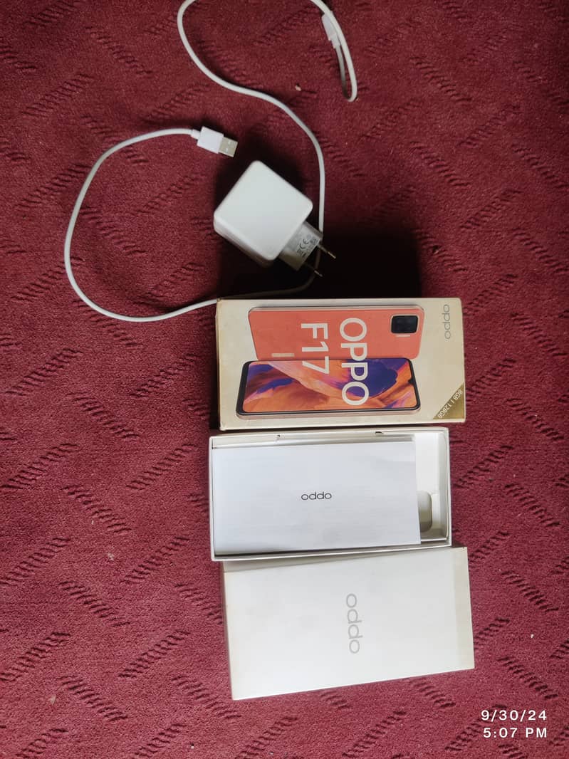 Oppo f17 8/128 full box charger price will be negotiable 5