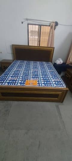 king size bed with 2 side tables