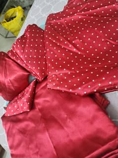 silk bedsheet and quilt cover on Red color