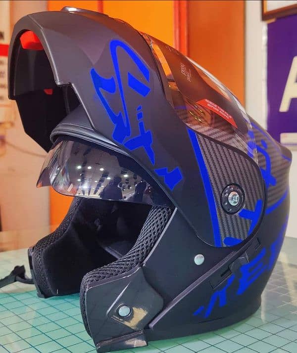 flipup dark blue helmet . 1