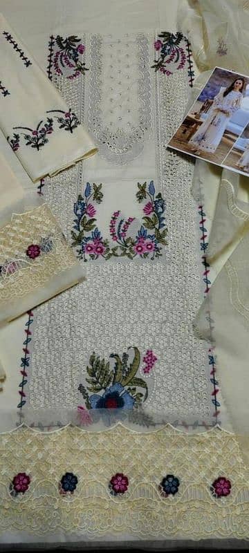 3  Pcs  Women's Unstitched Lawn Embroidered Suit. 1