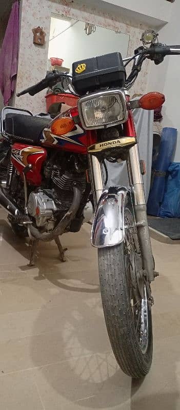 Honda 125 2020 model Red Colour Karachi Number 1