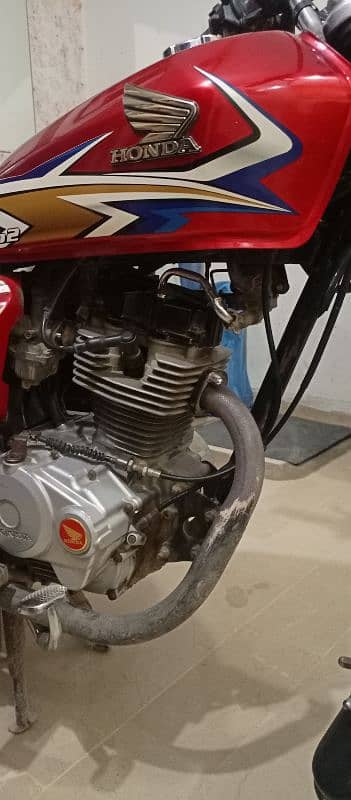 Honda 125 2020 model Red Colour Karachi Number 6