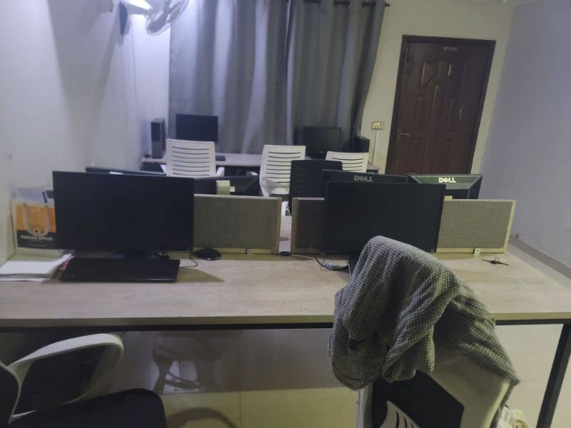 worstation with computer setup and chairs 2