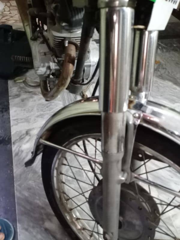 Honda 125 front shak 1