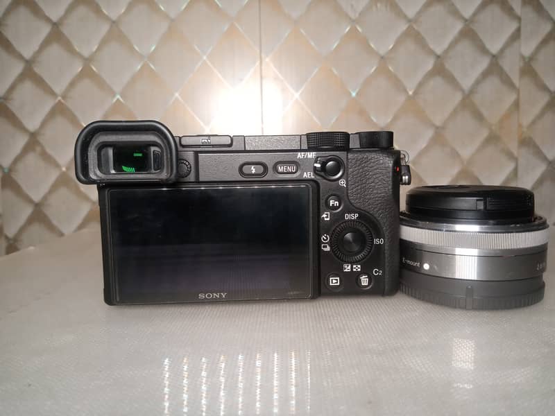 camera sony a6400 with sigma 30mm & sony 16mm 3