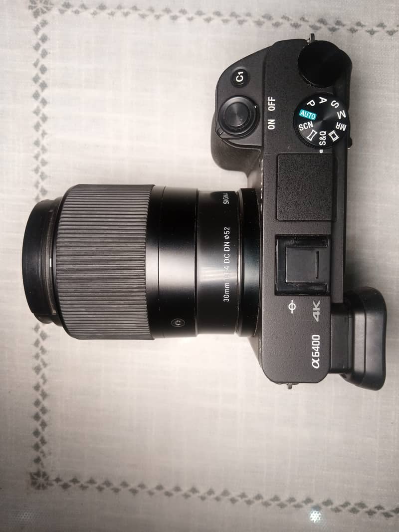 camera sony a6400 with sigma 30mm & sony 16mm 6