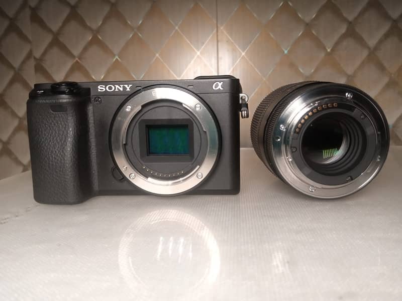 camera sony a6400 with sigma 30mm & sony 16mm 9