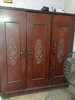 3 door wood cupboard available for sale