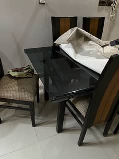 6 seater dinning table with glass table and  comfortable foam chair