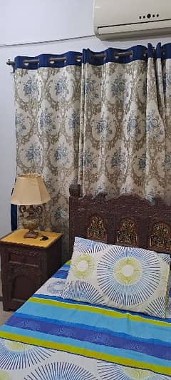 Two curtains size 90 inches length and 110 inches width wid Blue belts