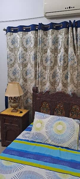 Two curtains size 90 inches length and 110 inches width wid Blue belts 0