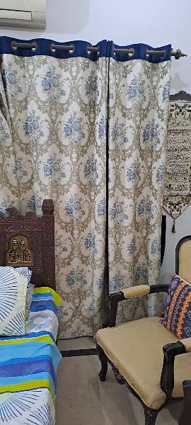 Two curtains size 90 inches length and 110 inches width wid Blue belts 2