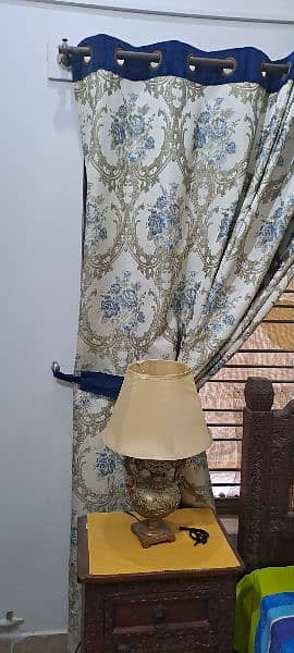 Two curtains size 90 inches length and 110 inches width wid Blue belts 3