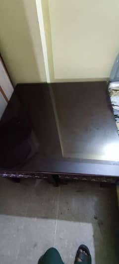 Dining table with glass on top and four sota seat [use for tv lounge]