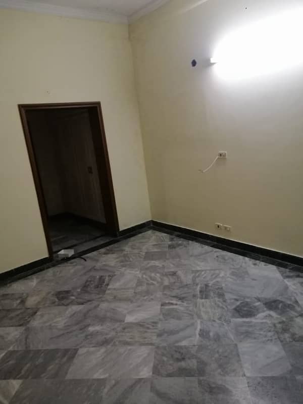 10 marla house for sale facing park wapda town k2 block 9