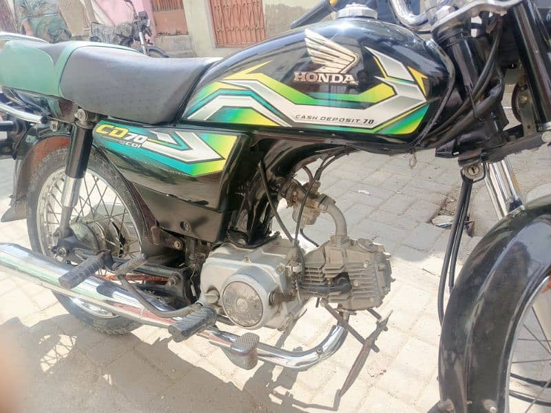 honda 70 2023 7 month karachi registerd new condition nut to nut geni 7