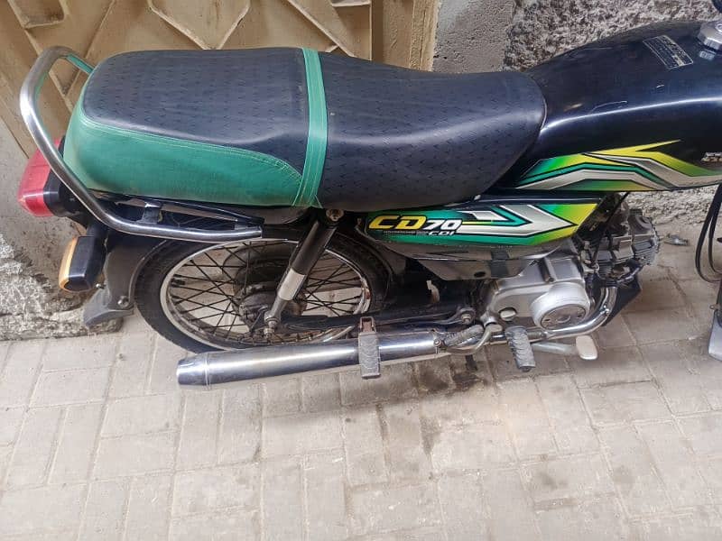 honda 70 2023 7 month karachi registerd new condition nut to nut geni 9