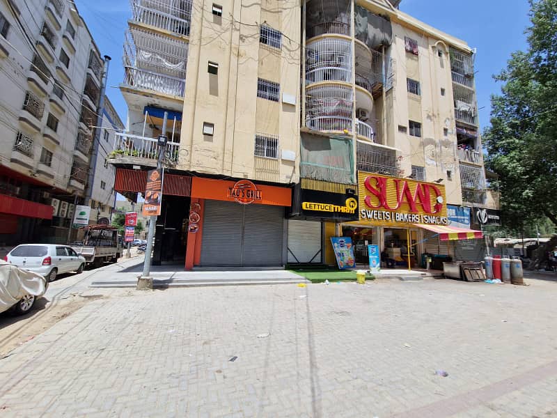 MAIN 200 FEET ROAD FACEING SHOP FOR SALE GULISTAN-E-JAUHAR NEAR RED APPLE 0