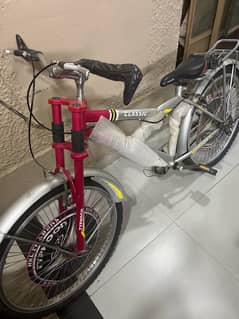 Beautiful red mountain bike in excellent condition is for sale