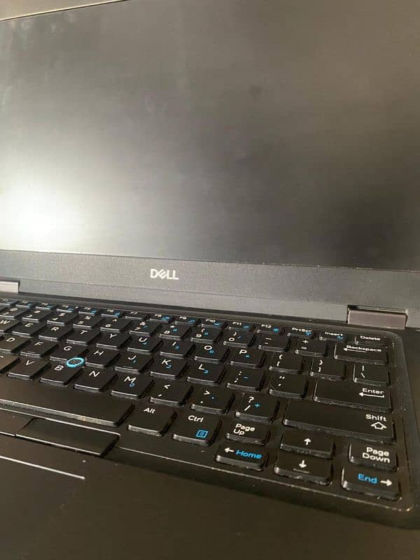 slightly used dell laptop with original charger and bag. 10/10 working 0