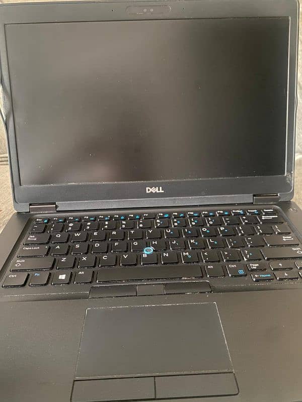 slightly used dell laptop with original charger and bag. 10/10 working 3