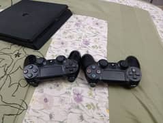 Sell ps4  slim with to controlar and Ps plus extra  id with 1 year