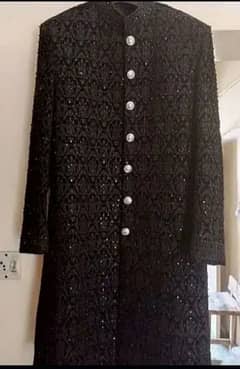 black colour sherwani with mehroon kula