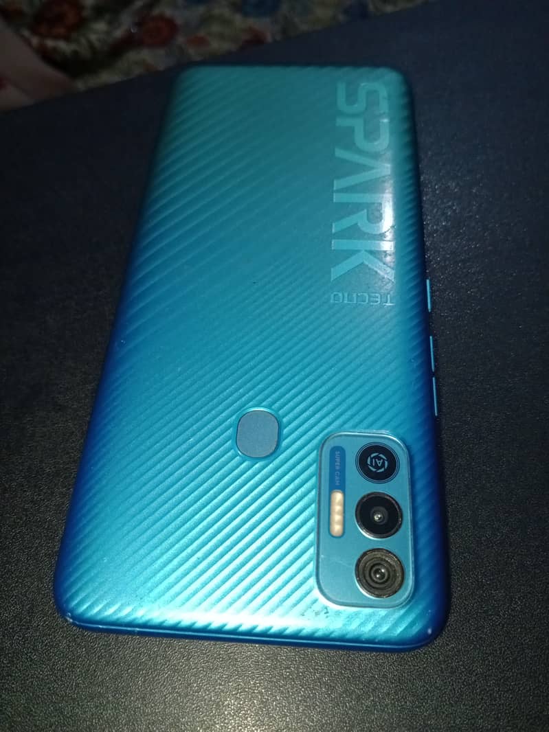 Tecno spark 7t Mobile 4