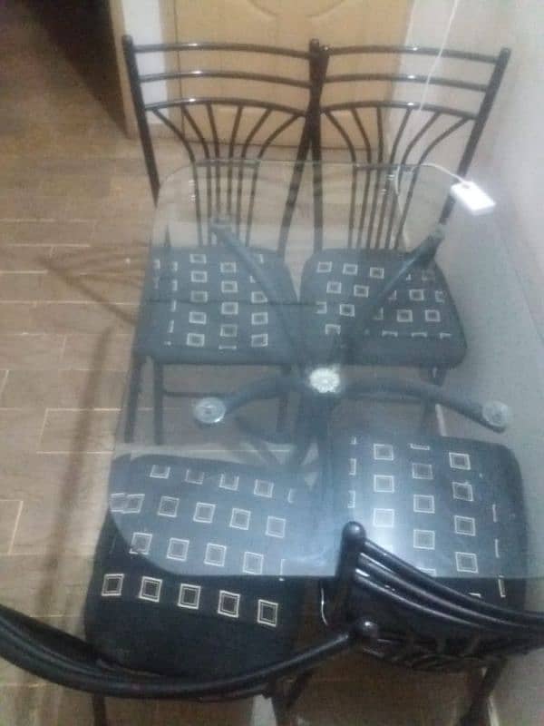 Iron dining table with four chairs 1