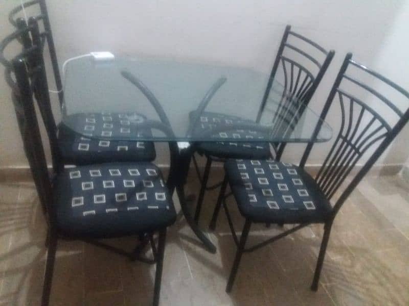 Iron dining table with four chairs 2