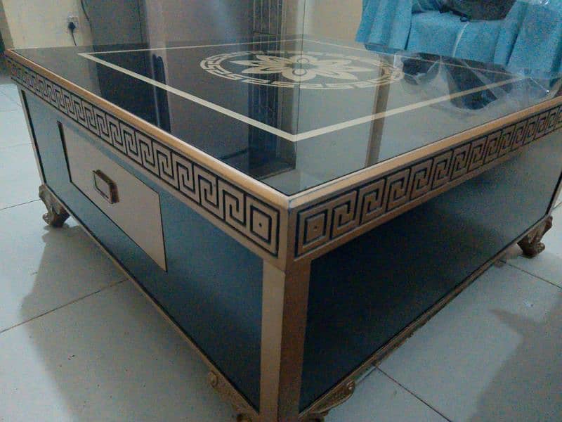 Center table with two cabinets black and golden 0