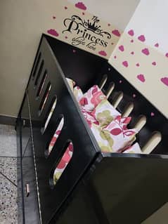 baby cot with cupboard