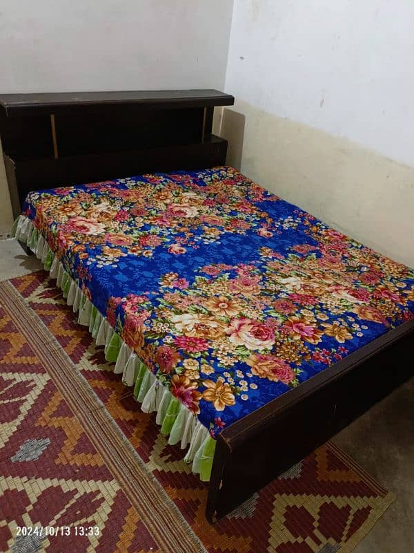 Wooden bed size 6.5 by 5 in good condition without mattress 0