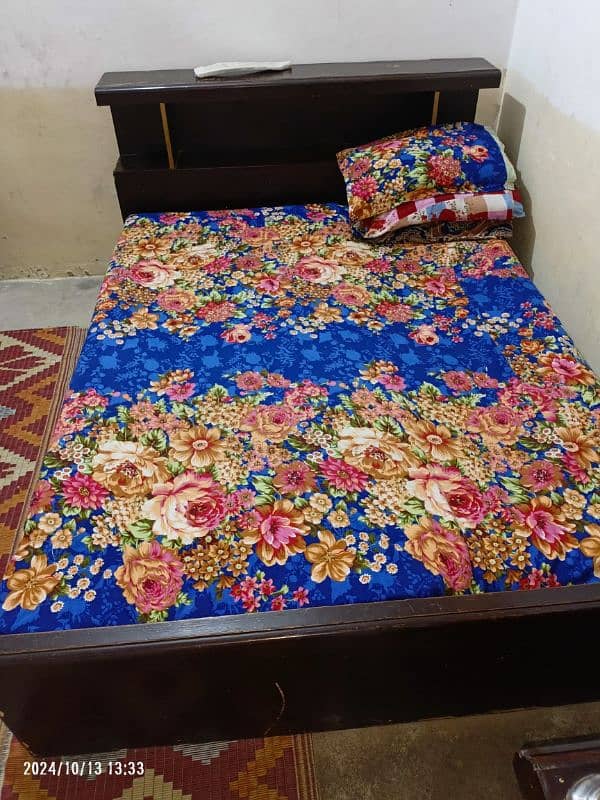 Wooden bed size 6.5 by 5 in good condition without mattress 2